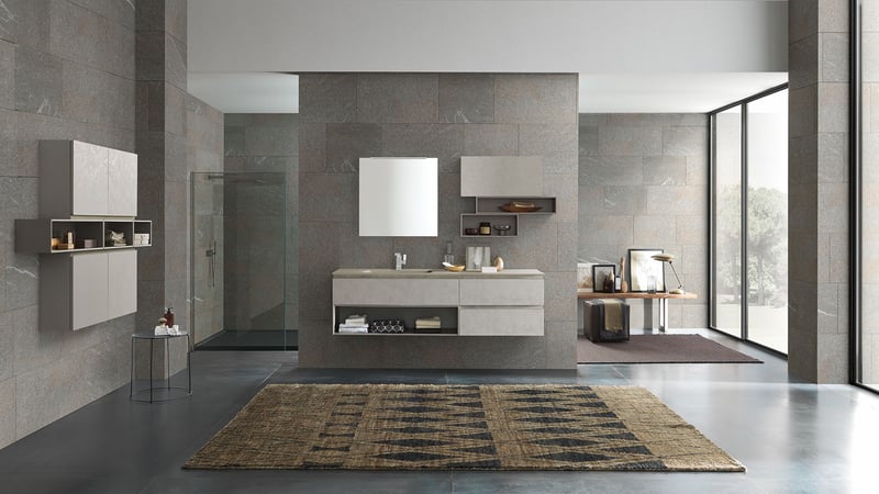 Contemporary bathroom featuring wall-mounted mirror and a modern floating vanity